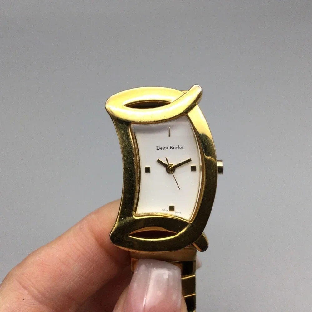 Delta Burke Womens Watch 25mm Gold Tone Asymmetrical Stretch Band New Battery